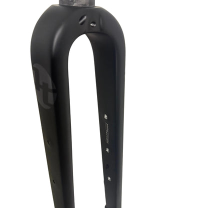 Close-up of Tout Terrain Gravel Fork crown and leg showing replaceable bottle bosses for cargo cages